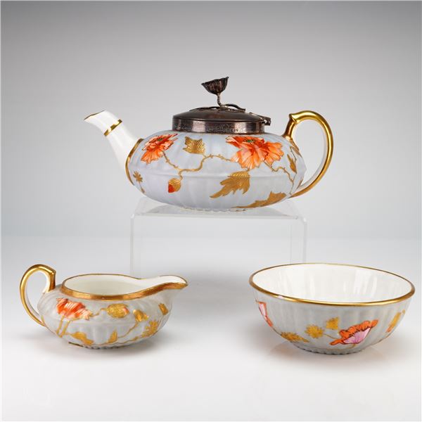A Three-Piece Wedgwood Blue Field Porcelain Tea Set with Sterling Silver Lid and Poppy Finial