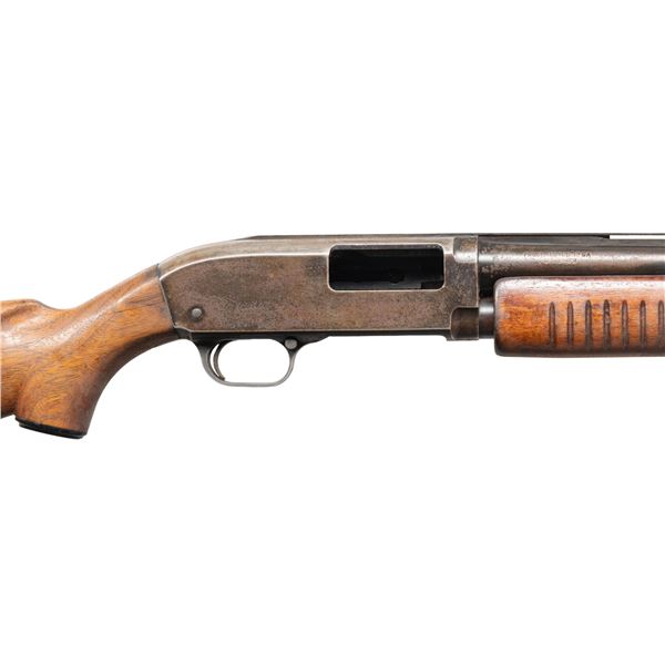 JC HIGGINS M20 SLIDE ACTION SHOTGUN.