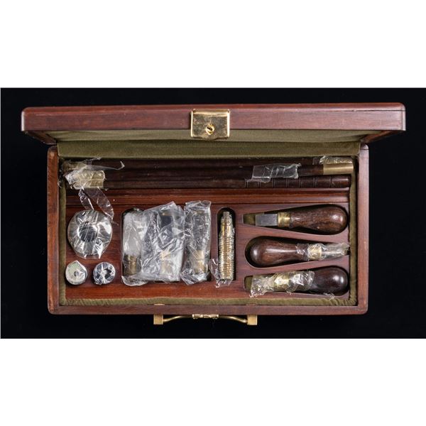 MAHOGANY CASED SHOTGUN CLEANING KIT.
