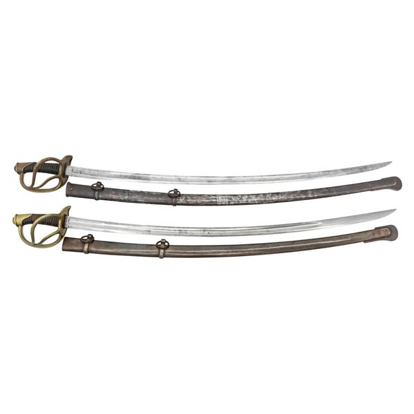 TWO CIVIL WAR ERA IMPORT HEAVY CAVALRY SABERS.