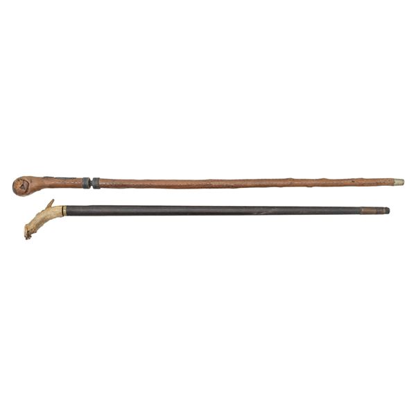 TWO VINTAGE SWORD CANES.
