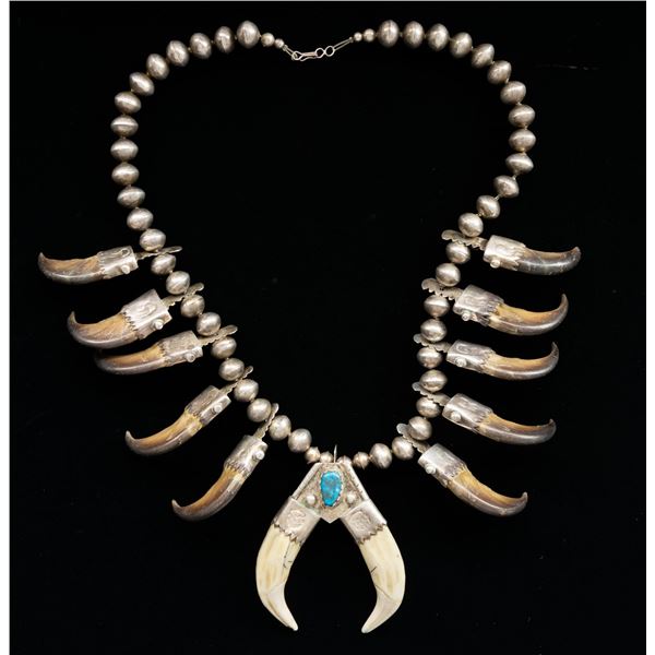 SIGNED SILVER NAVAJO BEAR CLAW NECKLACE.