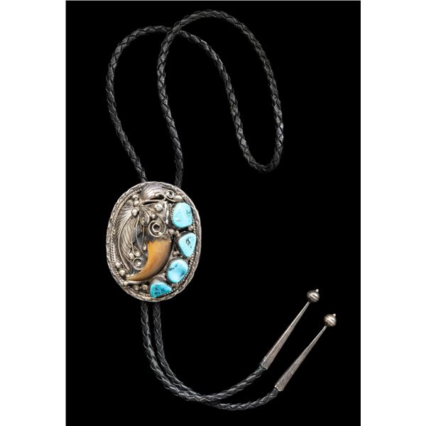 SIGNED STERLING NAVAJO TURQUOISE & BEAR CLAW BOLO.