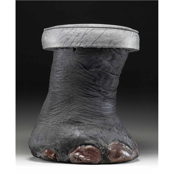 REAL ELEPHANT FOOT MADE INTO A STOOL.