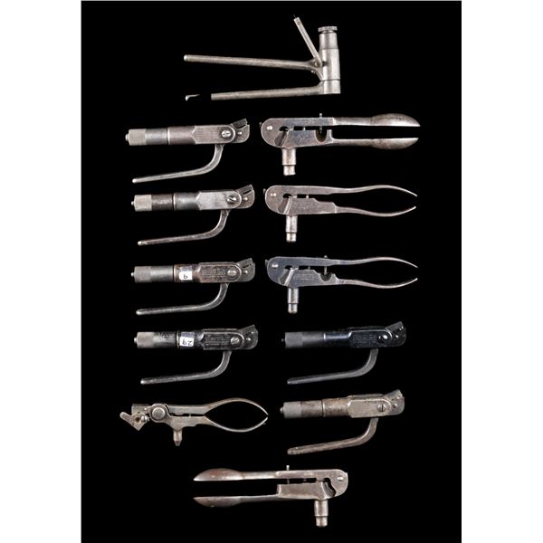 11 ANTIQUE WINCHESTER RELOADING TOOLS.