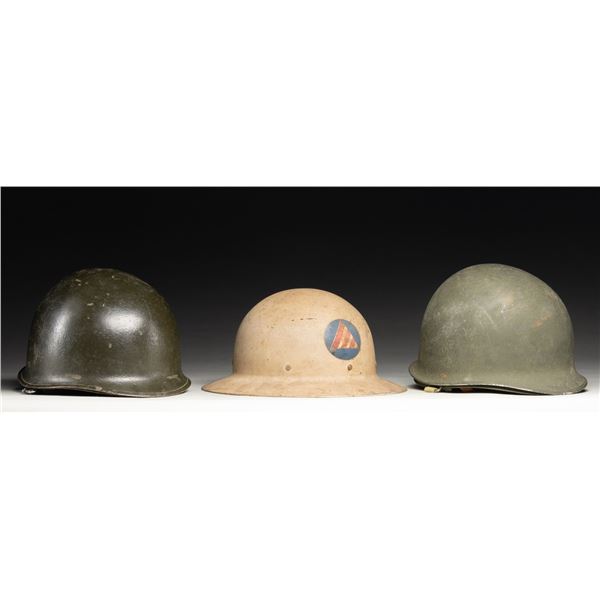 TWO U.S. WWII M1 HELMETS AND ONE CIVIL DEFENSE AIR