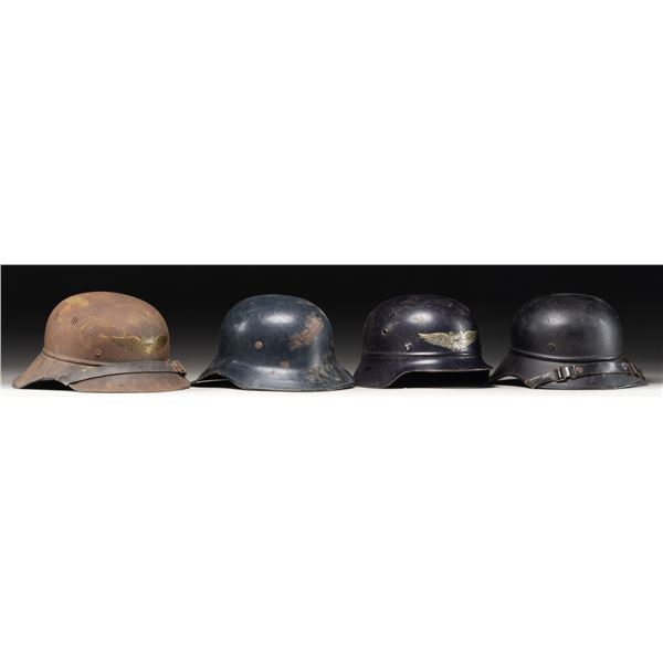 4 WWII GERMAN LUFTSCHUTZ HELMETS.