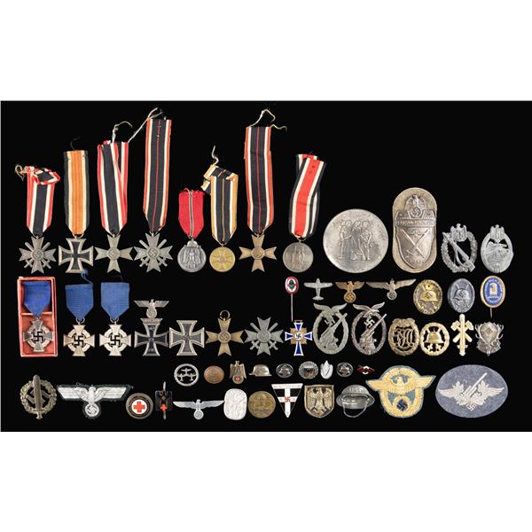 COLLECTION OF WWII GERMAN MEDALS, BADGES AND MORE.