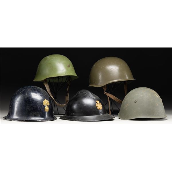 GROUPING OF 5 MILITARY HELMETS.