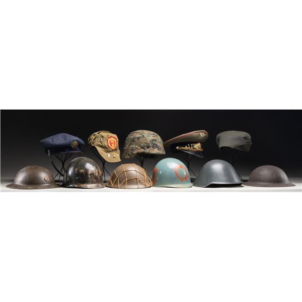 11 PIECES OF MILITARY HEADGEAR.