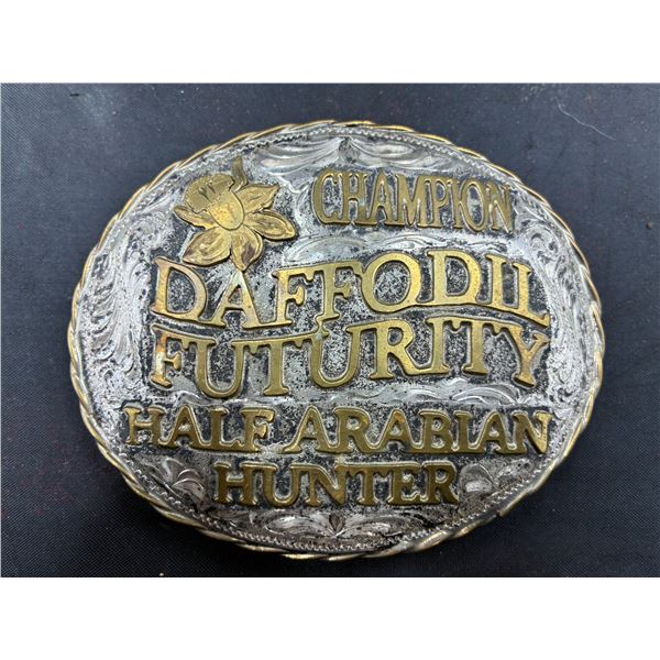 Rodeo belt buckle with sterling overlay