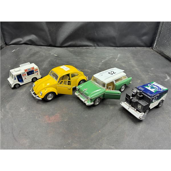 4 die cast cars, largest 5"