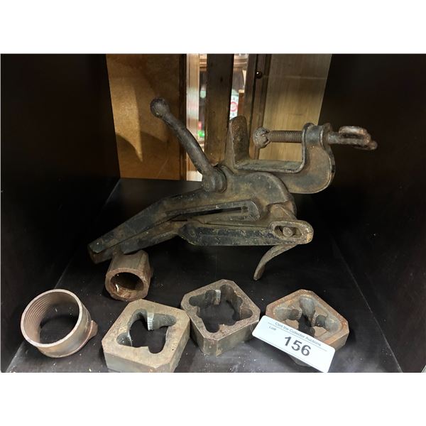 Antique metal clamp and pieces