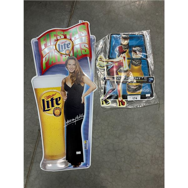 2 tin signs