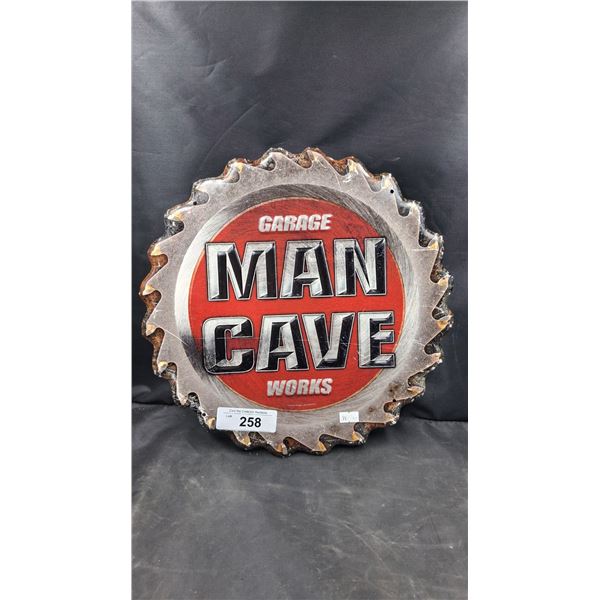 Tin Mancave sign 14" dia