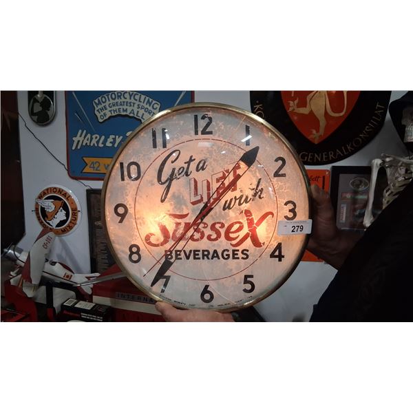 Vintage Sussex Beverages light up clock, crack in clock face