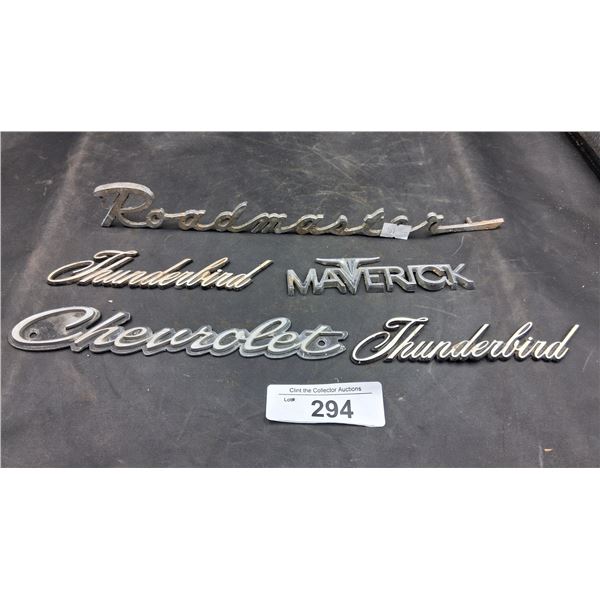 5 vintage car emblems