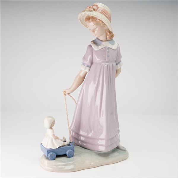 Lladro Porcelain Figurine Girl with Toy Wagon 01005044