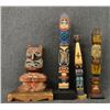 Image 1 : FOUR DECORATIVE TOTEM POLLS