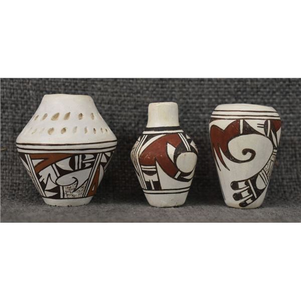 THREE MINIATURE HOPI POTTERY VASES (LORETTA NAVASIE)
