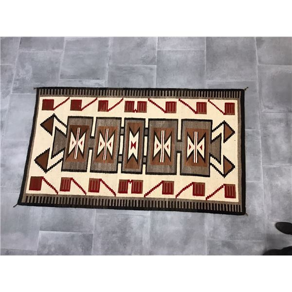 Navaho Style Storm Pattern Rug with Red, White, Brown, and Black Accents