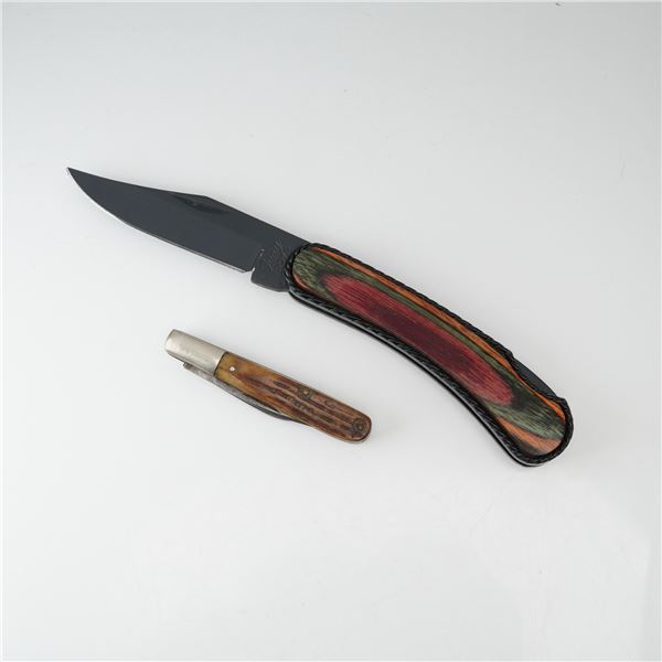 Two Folding Pocket Knives Including Fury 10074 and Queen City Cutlery