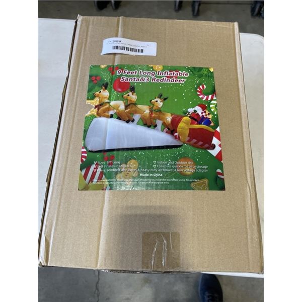 9 FOOT LONG INFLATABLE SANTA  AND 3 REDINDEER