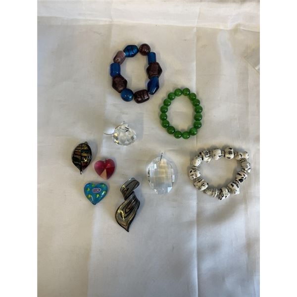 3 HEAVY GLASS BEADS BRACELETS AND 6 GLASS PENDANTS