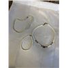 Image 1 : 2 HAWAIIAN PUKA SHELL SURFER NECKLACES AND ONE ANKLET