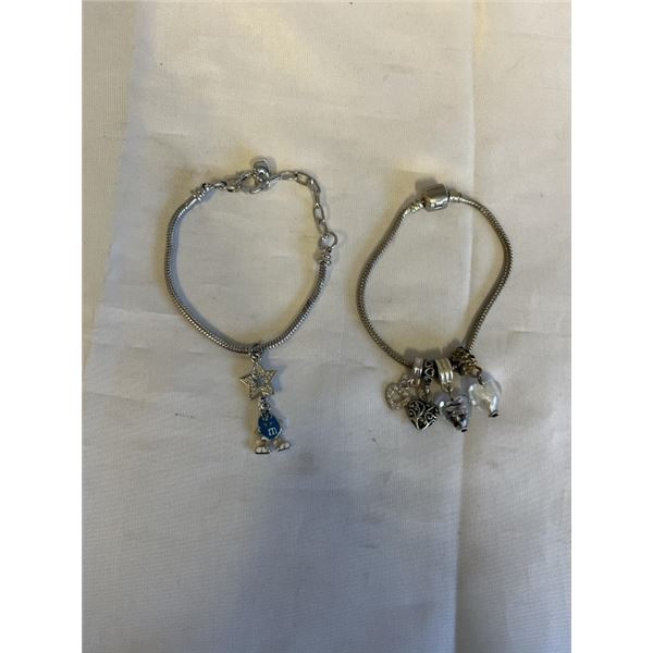 2 SILVER TONE CHARM BRACELETS