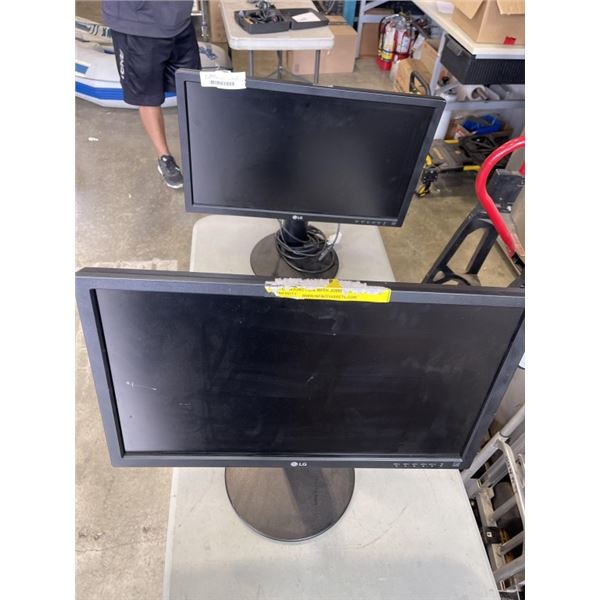 2 COMPUTER MONITORS ON DESK MOUNTS