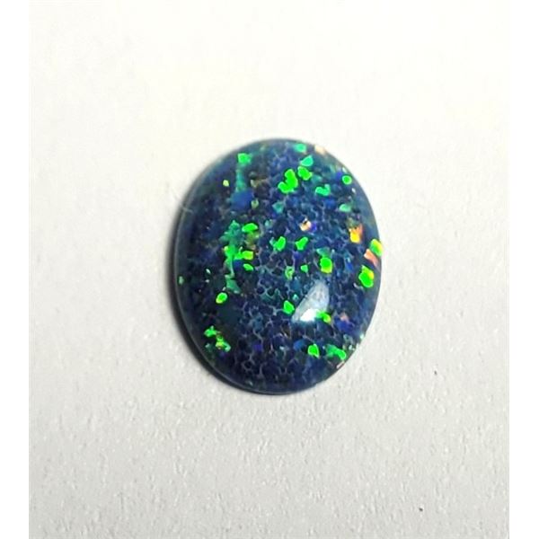 18)  NATURAL OVAL BLUE FIRE BLACK