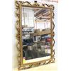 Image 1 : MID-CENTURY SYROCO FRAMED MIRROR 31 IN X 21 IN