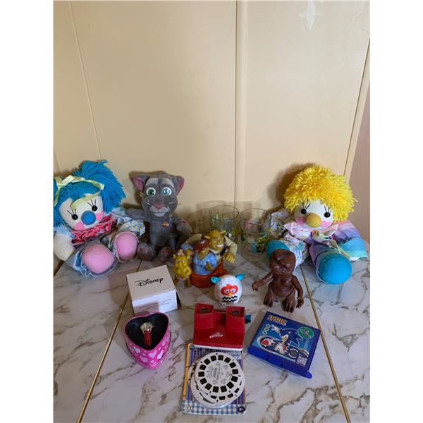 Collectibles Lot Including Plush Toys, Character Glasses, and Novelty Items