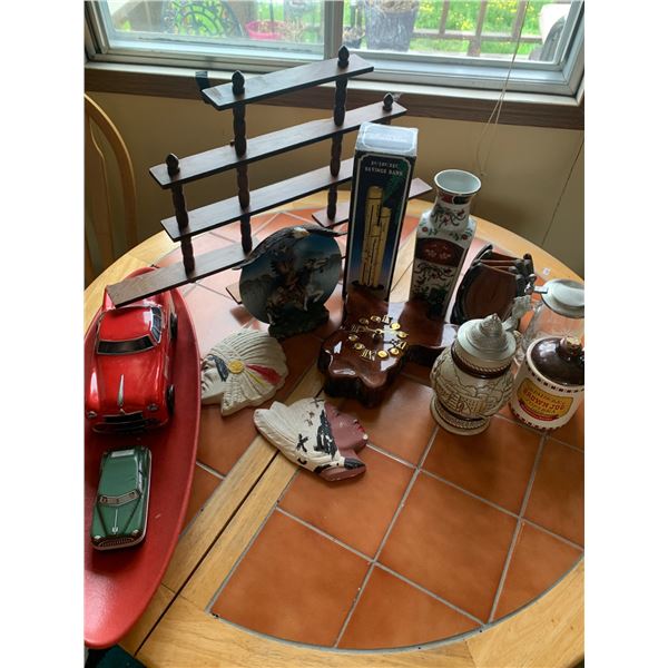 Decorative Items Including Figurines, Coasters, and Banks
