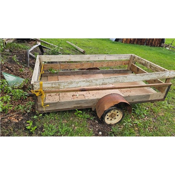 Small Wooden Utility Trailer With Metal Wheels and Frame