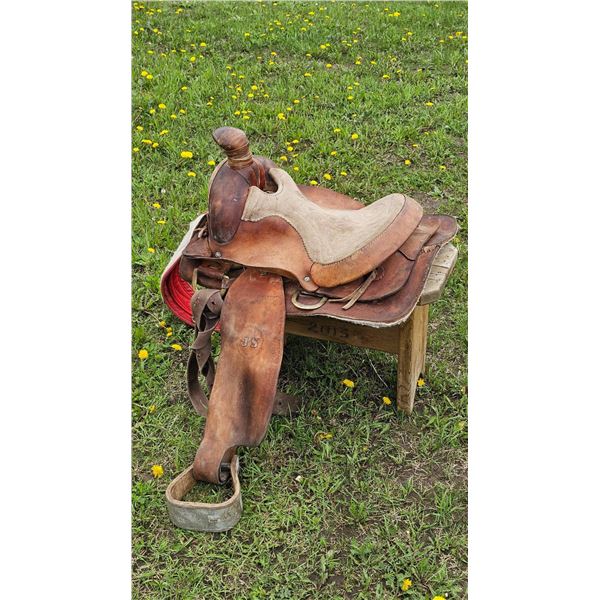 Western Saddle with Tooled Leather and JS Insignia