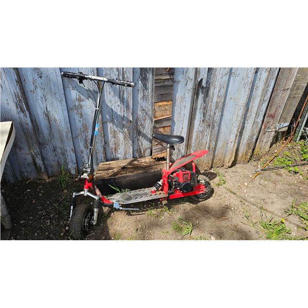 Gas-Powered Red Scooter With Seat and Steel Deck