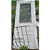 Image 3 : Rustic Metal Gate and Weathered Wooden Screen Door