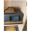 Image 5 : Wooden Shelving Unit with Mixed Household Items, Commodore VIC-20 Box, and Electronics
