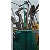 Image 1 : Garden Tools in a Green Plastic Storage Barrel