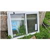 Image 1 : Jeld-Wen Double-Glazed Vinyl Sliding Window with Screen