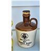 Image 4 : Three Ceramic Items: Police Bear Cookie Jar, Lion Planter, and Browns Port Jug