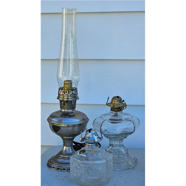 Three Oil Lamps Including Glass and Metal Aladdin Lamp
