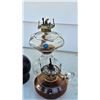 Image 2 : Three Glass Oil Lamps with Floral Motif and Decorative Accents