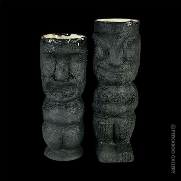 SET OF TWO (2) HOBBYIST LAVA  GLAZE VERSIONS OF TOBY DESIGNS MISSIONARY DOWNFALL NUI TIKI MUGS.