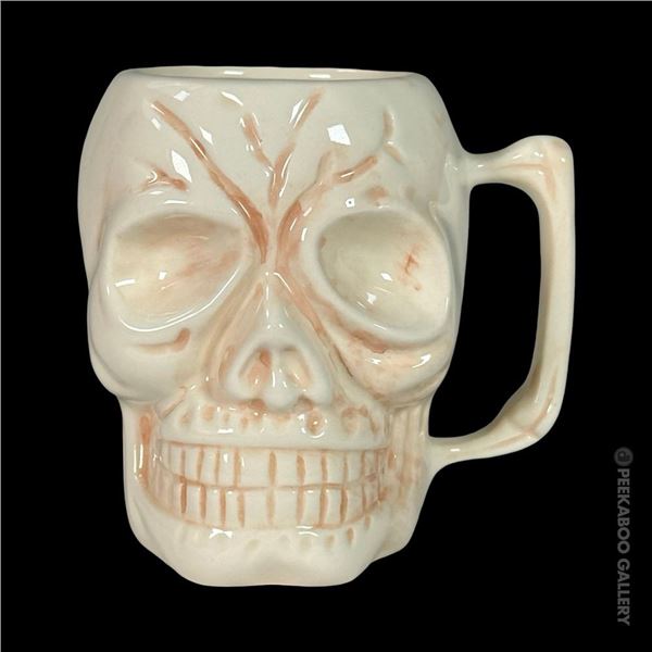 KAHIKI COFFEE GROG HANDLED SKULL MUG.