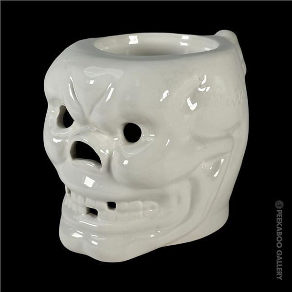 TRADER VIC'S WHITE HANDLED SKULL MUG.