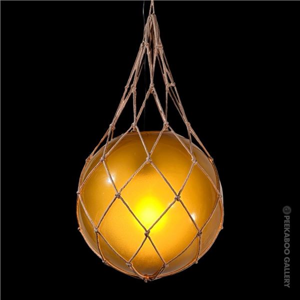ORIGINAL OCEANIC ARTS 12" AMBER YELLOW GLASS FLOAT IN NETTING with OPENING FOR LIGHT.