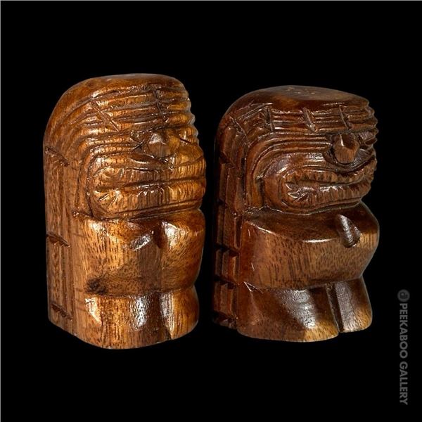 VINTAGE HAND-CARVED TIKI SALT & PEPPER SHAKERS.